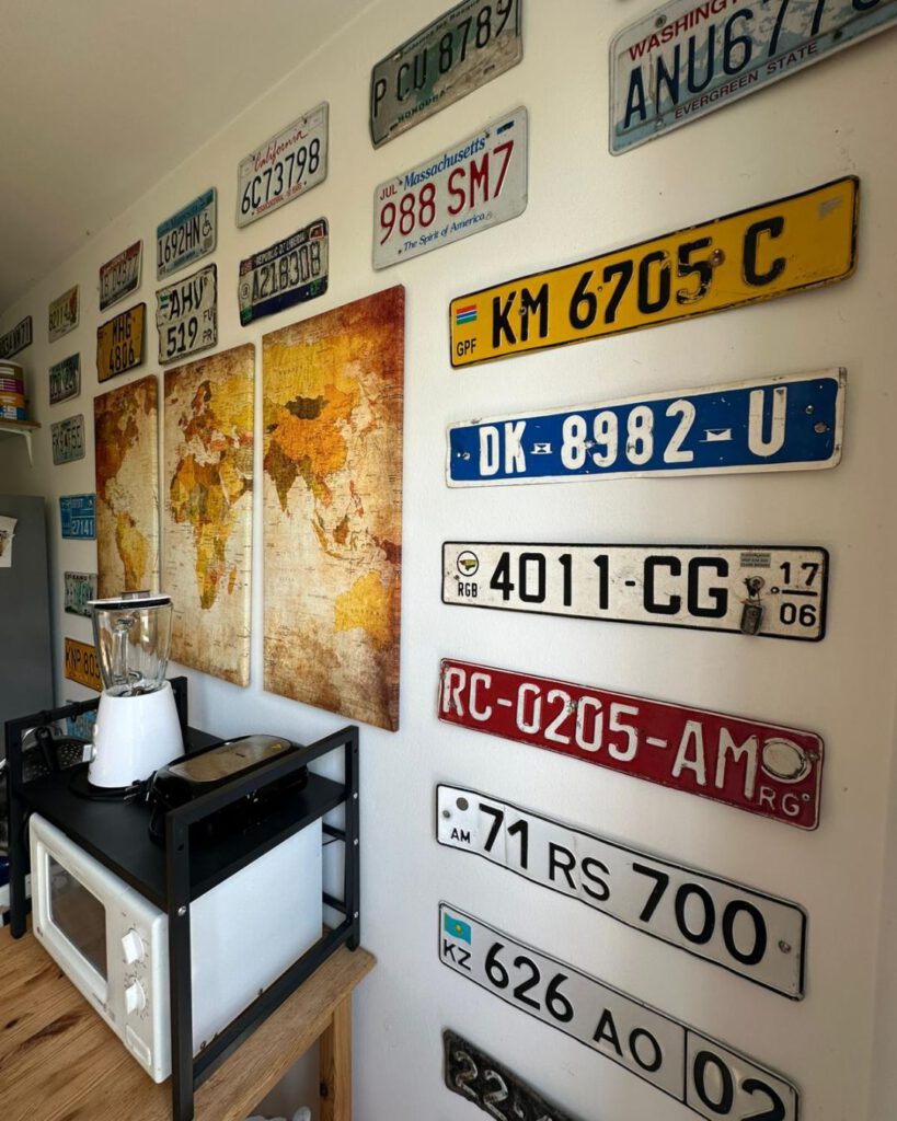 I decorate my kitchen with licence plates from different countries. 