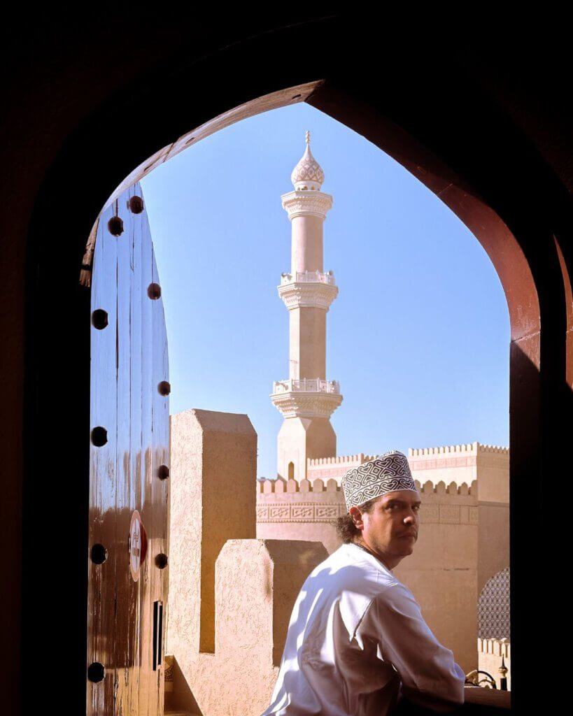 A wide road stretching across Oman’s vast landscapes, perfect for an adventurous road trip