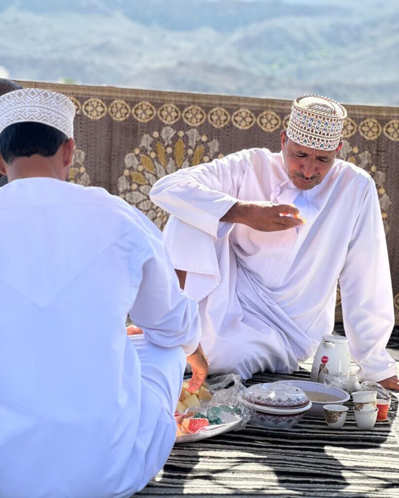 A local Omani man in traditional attire, showcasing the rich cultural experiences Oman has to offer