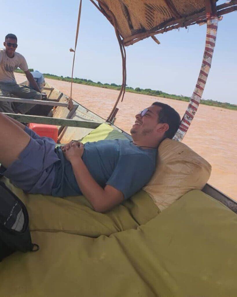 me resting during the river cruise at the Niger river