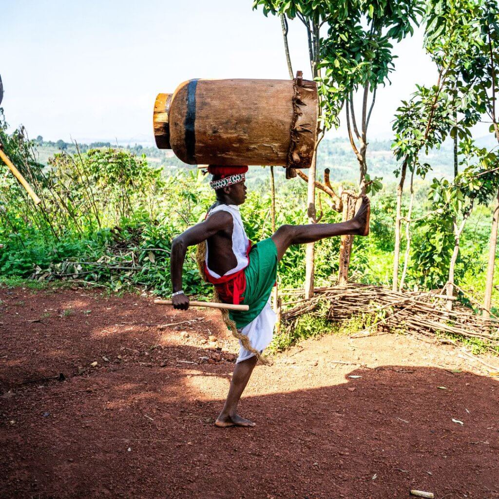 Player holding a giant drum