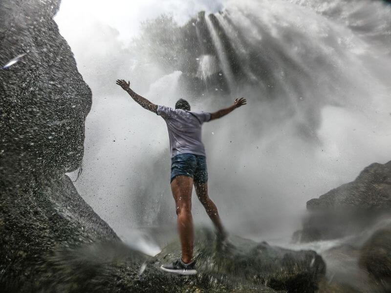 Standing below the Pulhapanzak Waterfalls