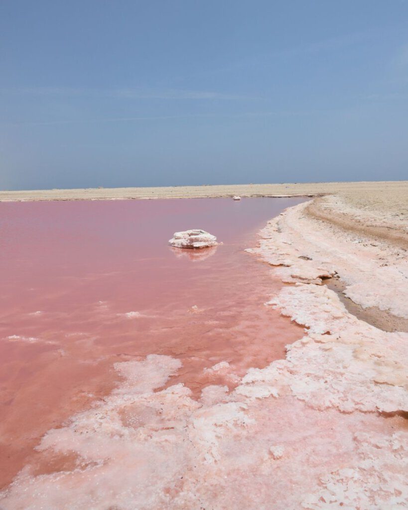 The pink lake in Oman is one of the places you can visit without a 4WD. 