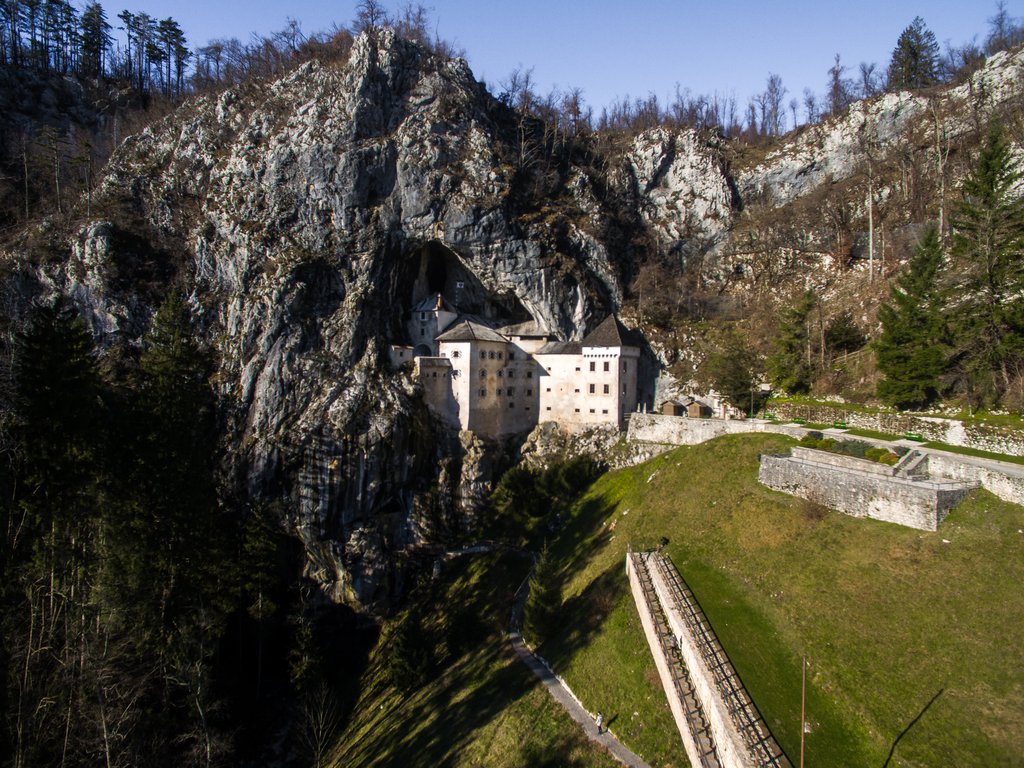 Aerial view of the Predjama Castle - Visit Postojna Aerial view of the Predjama Castle