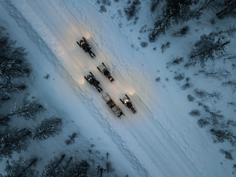 Snowmobiles in the Svansele Wilderness Camp