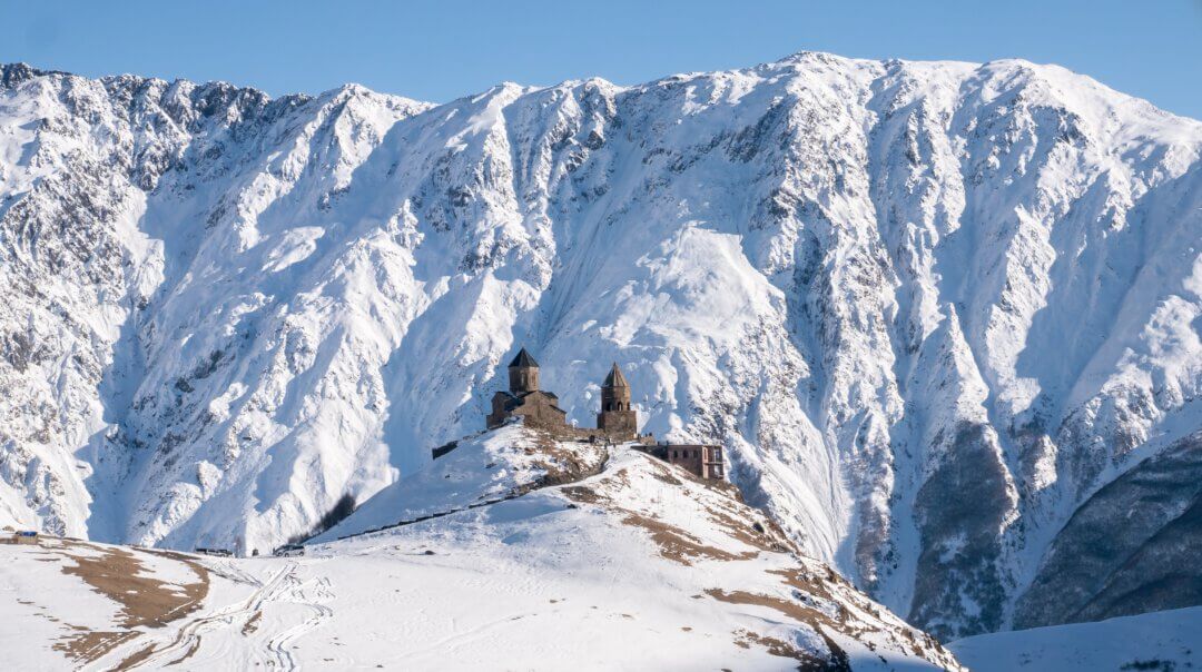 Road trip in Georgia Gergeti Trinity Church on Winter