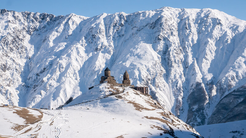 Road trip in Georgia Gergeti Trinity Church on Winter