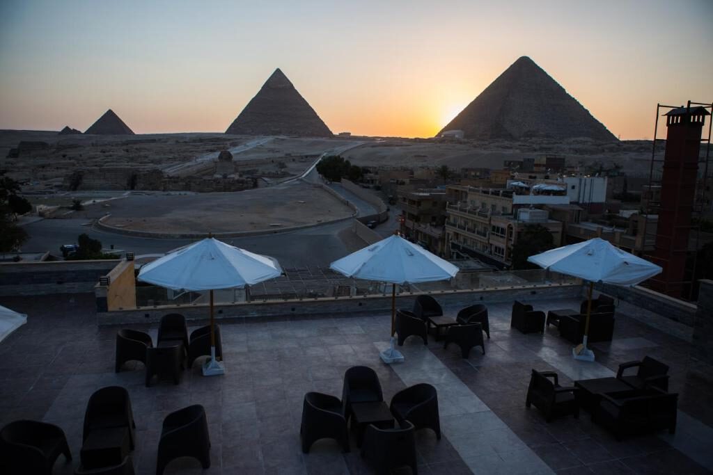 Hayat Pyramids View HotelAn inviting terrace with views of the Pyramids and the Sphinx