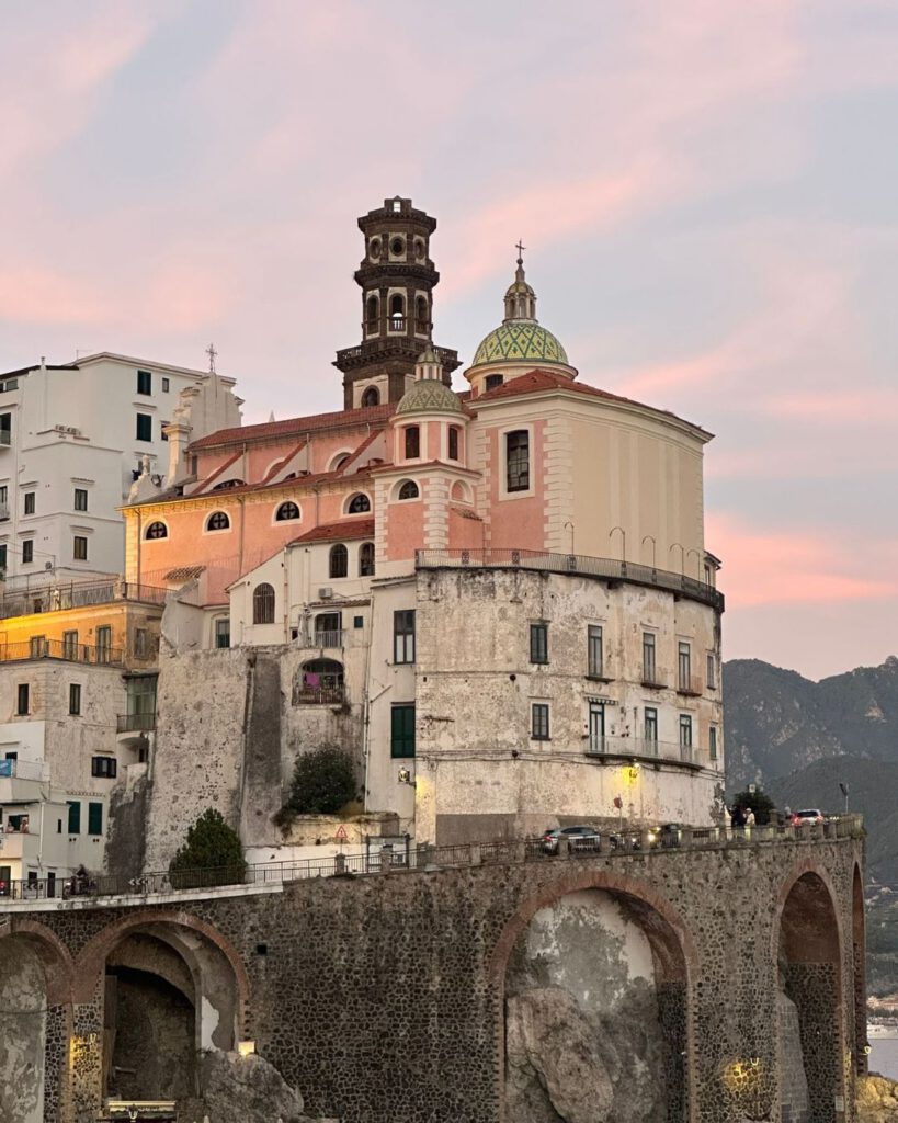 Its pastel houses cluster tightly around a central piazza, and the small beach feels like a secret corner reserved for locals. It has a charm that is intimate, authentic, and far less crowded.