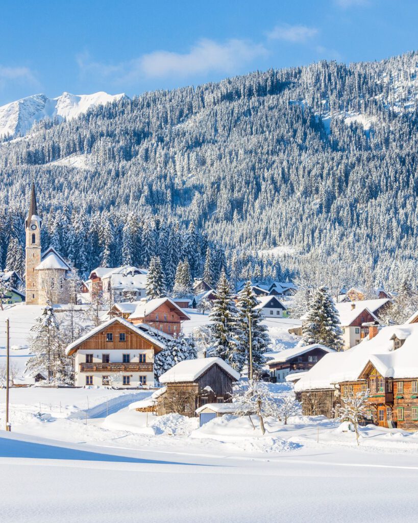 Austria’s twin winter gems shine in December. Innsbruck sits in the heart of the Alps, perfect for skiing and snowboarding, while Salzburg enchants with Mozart concerts and dreamy Christmas markets.