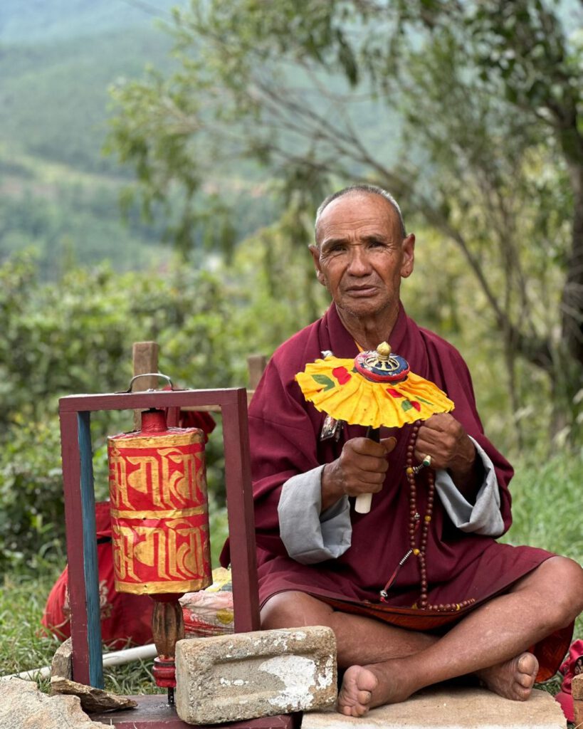Bhutan monk praying at the mountain