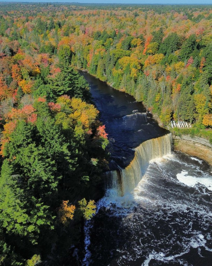 Fall transforms the park into a corridor of color, with the tannin-rich river reflecting golds and reds.